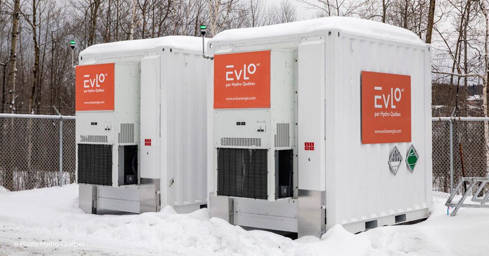 Two EVLO energy storage containers outside in the winter.