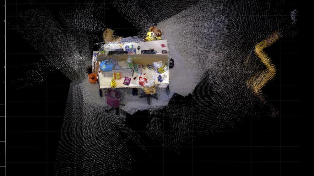 Visual SLAM with an RGB-D Camera A dense scene reconstruction created by applying visual SLAM to data from an RGB-D camera.